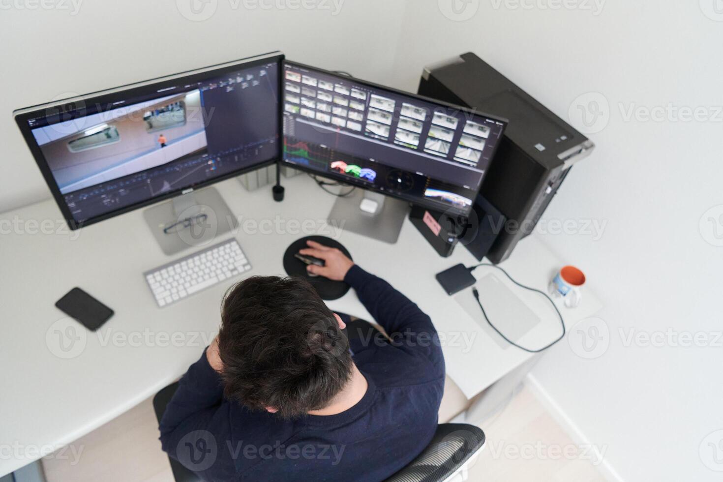 professional editor enhancing digital footage using specialized software photo