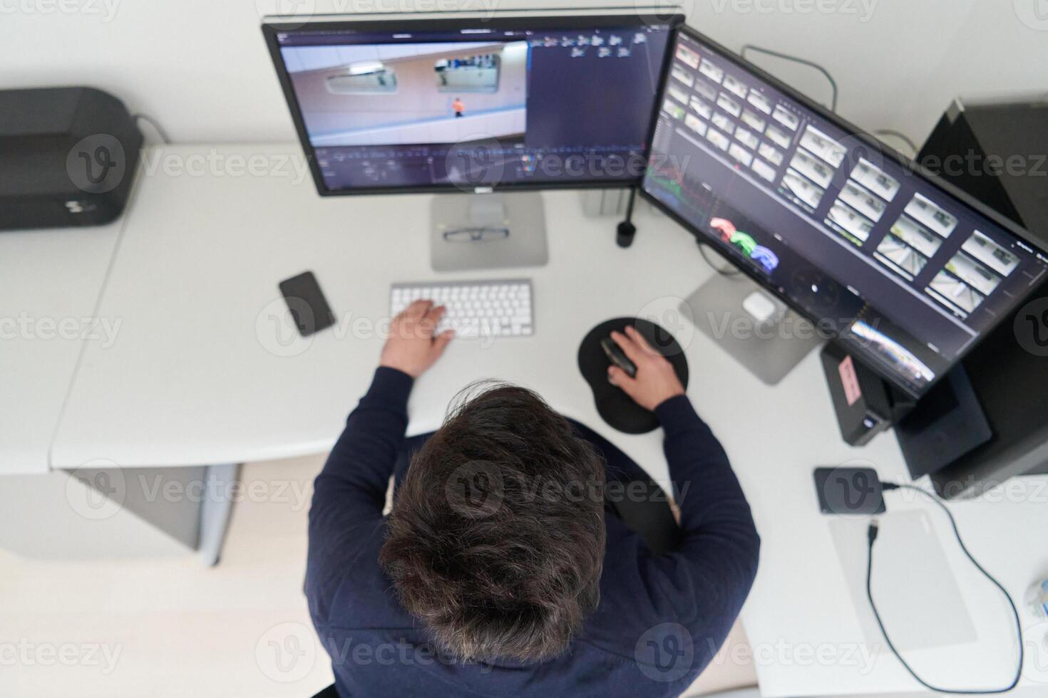 professional editor enhancing digital footage using specialized software photo