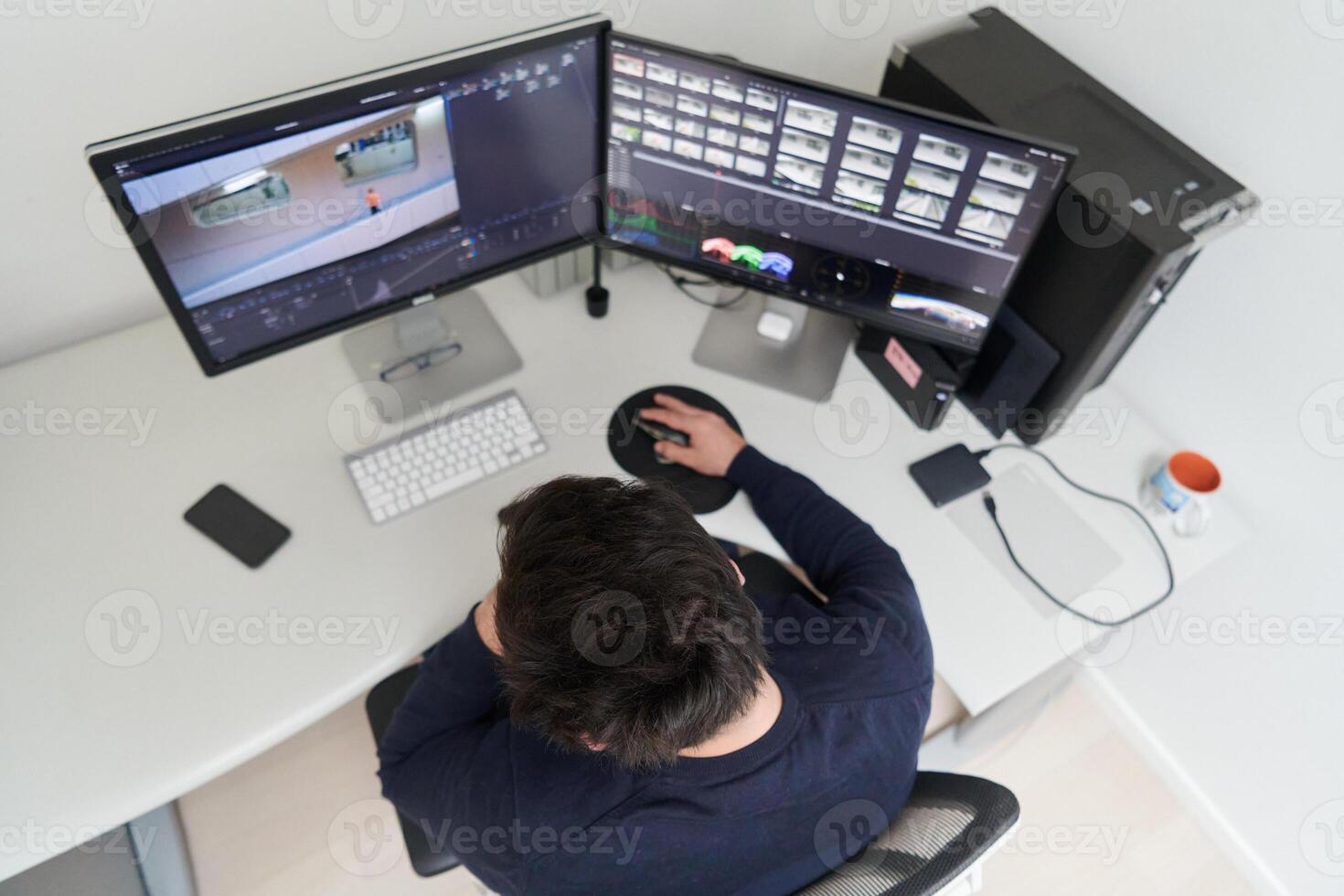professional editor enhancing digital footage using specialized software photo