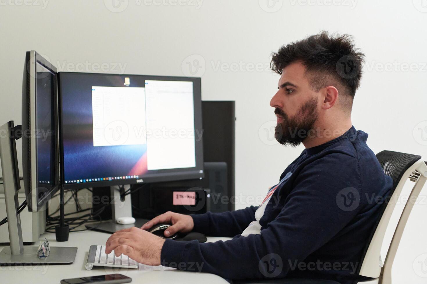 professional editor enhancing digital footage using specialized software photo