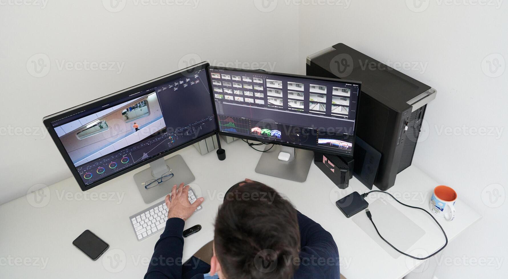 professional editor enhancing digital footage using specialized software photo