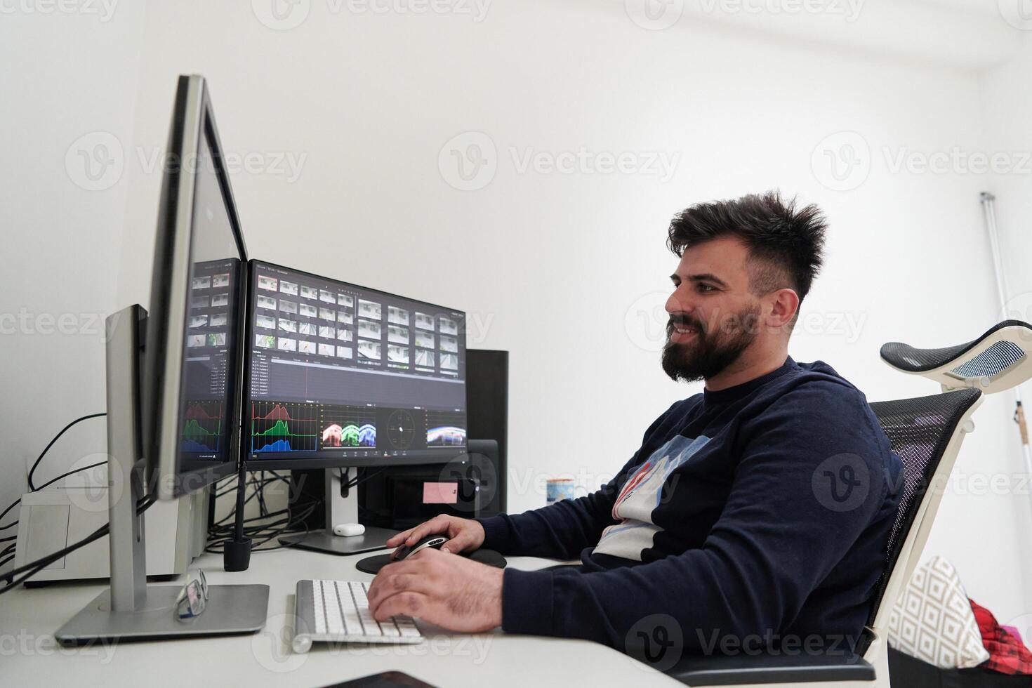 professional editor enhancing digital footage using specialized software photo