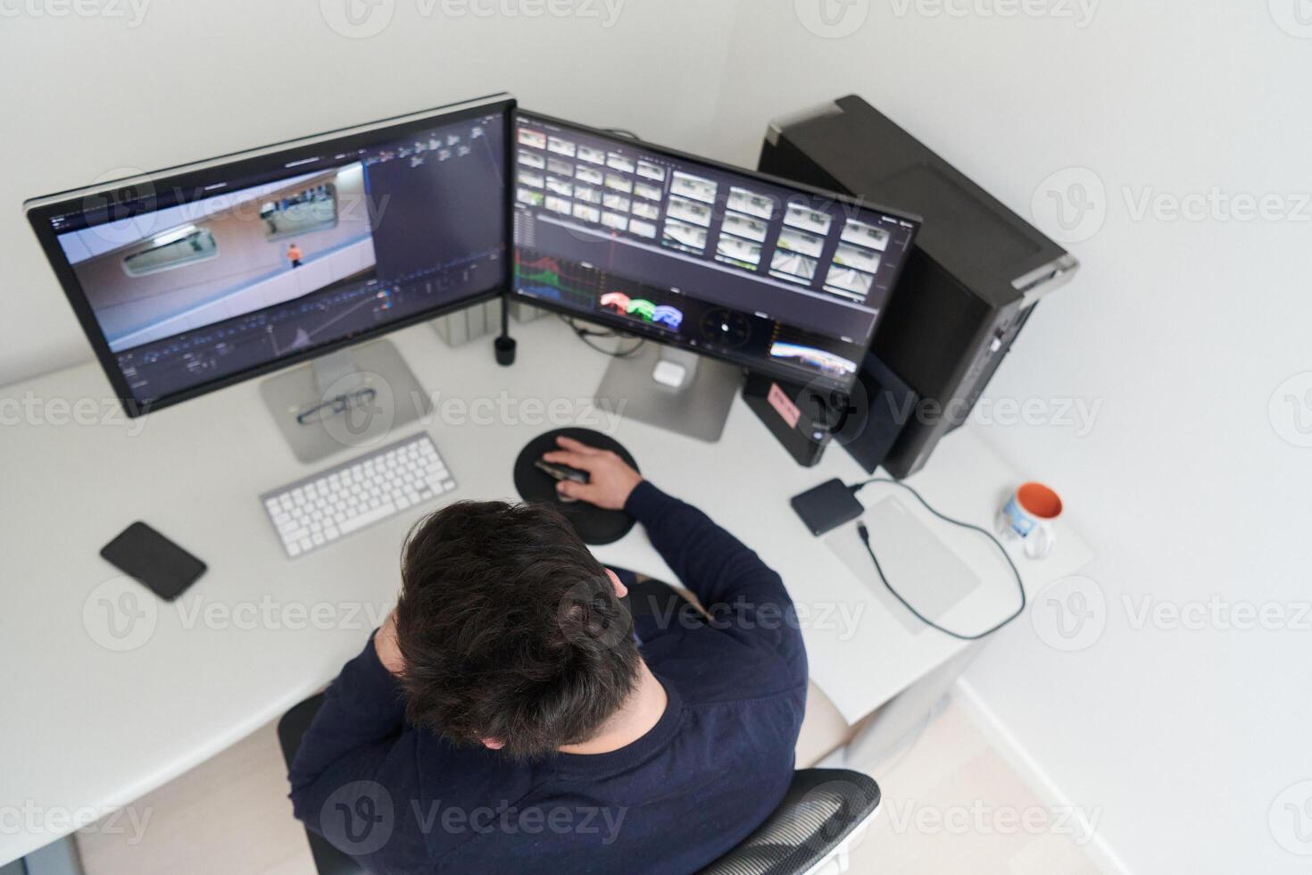 professional editor enhancing digital footage using specialized software photo