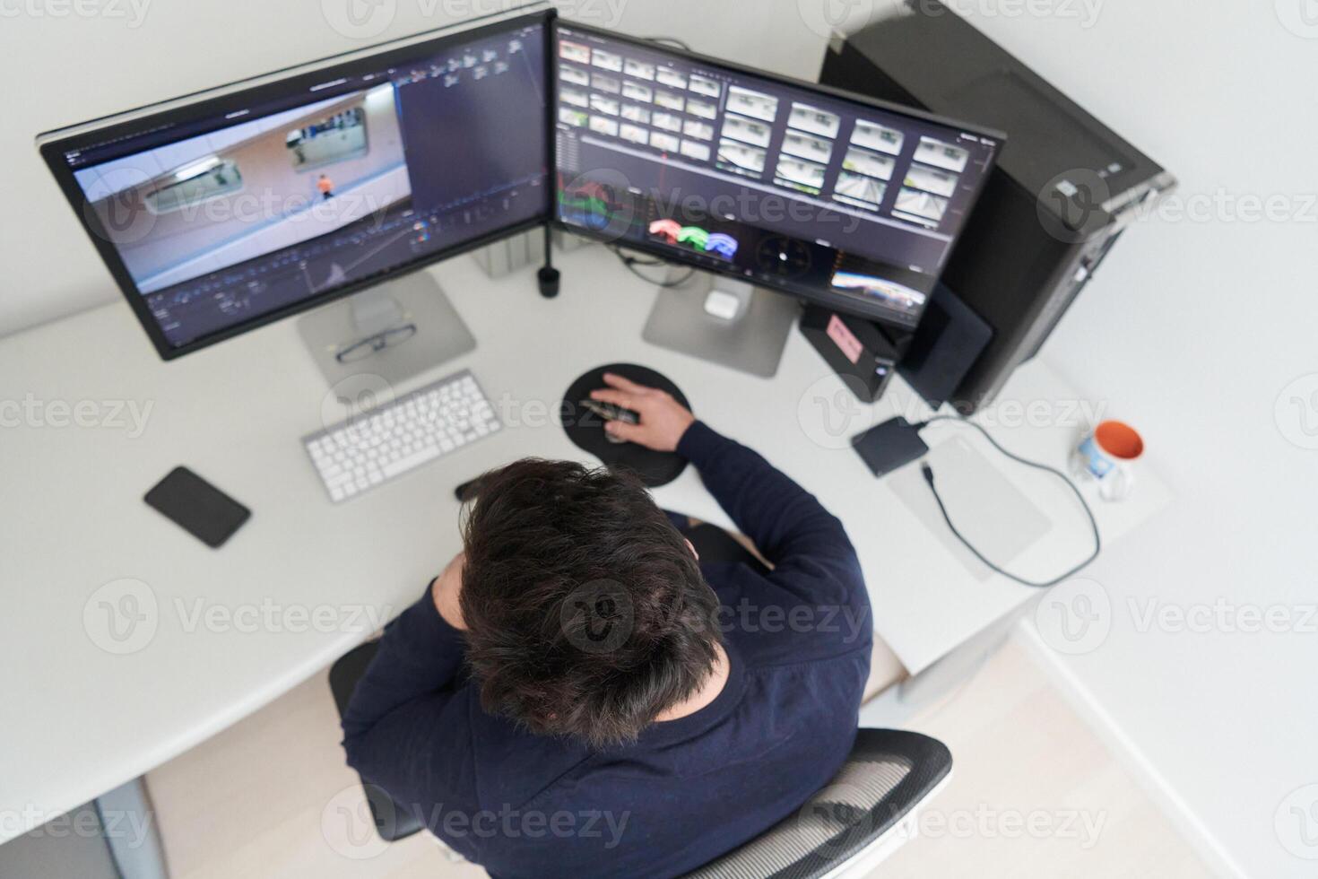 professional editor enhancing digital footage using specialized software photo
