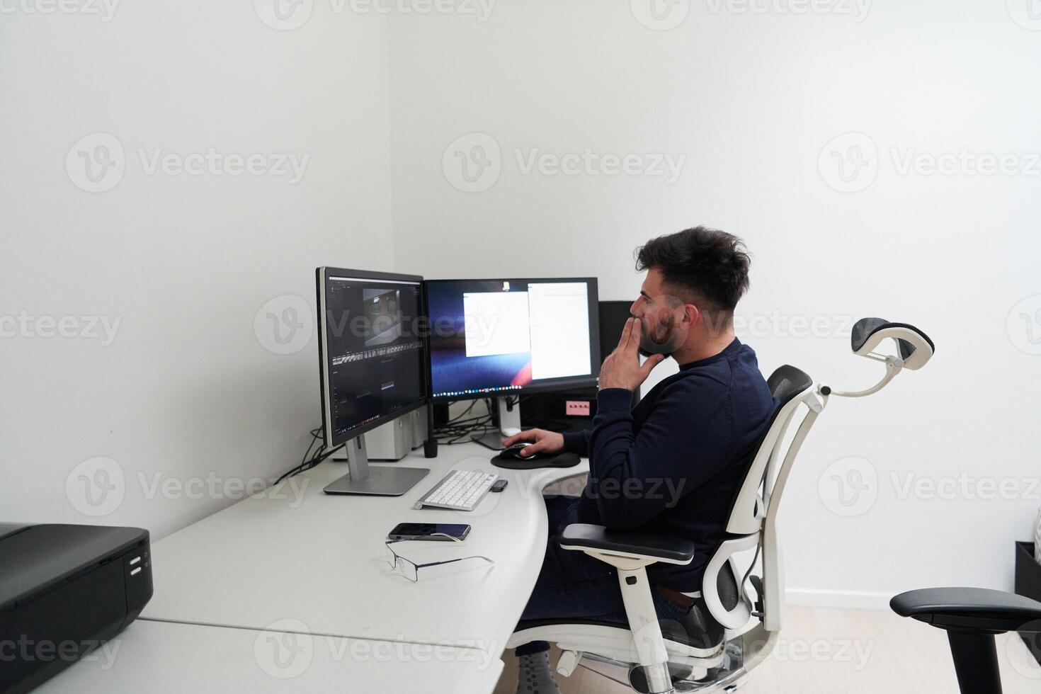 professional editor enhancing digital footage using specialized software photo