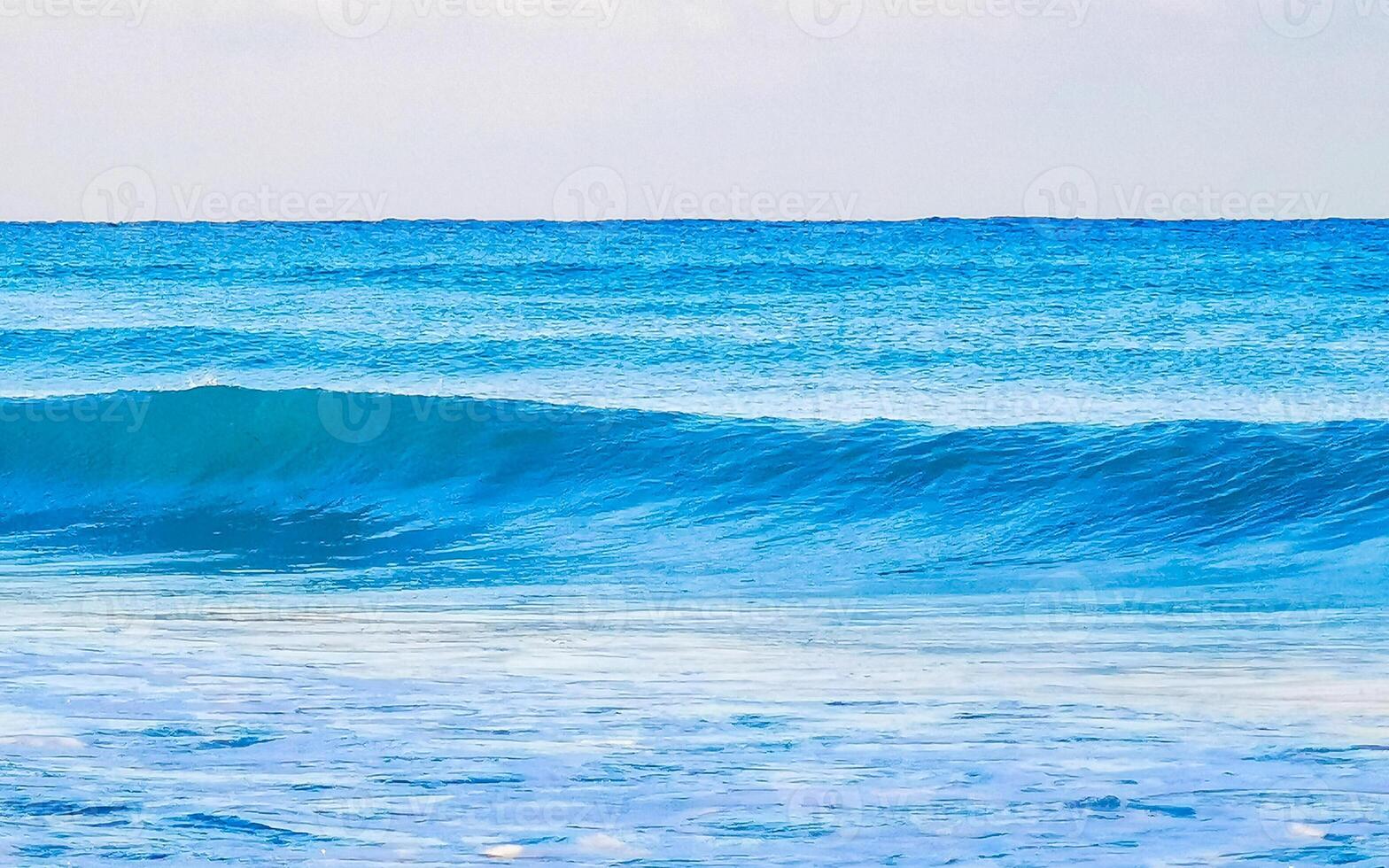 Tropical Caribbean beach clear water waves Playa del Carmen Mexico. photo