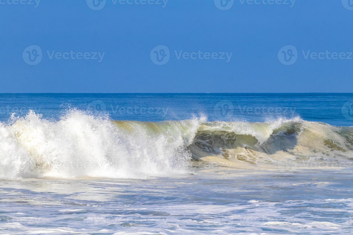 Extremely huge big surfer waves at beach Puerto Escondido Mexico. photo
