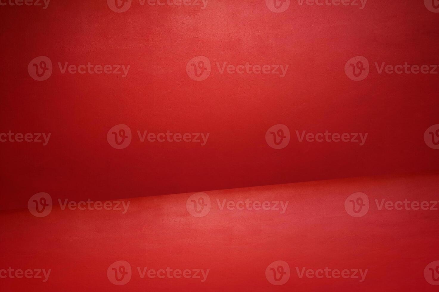 The floor and walls of the room are red as the background. photo