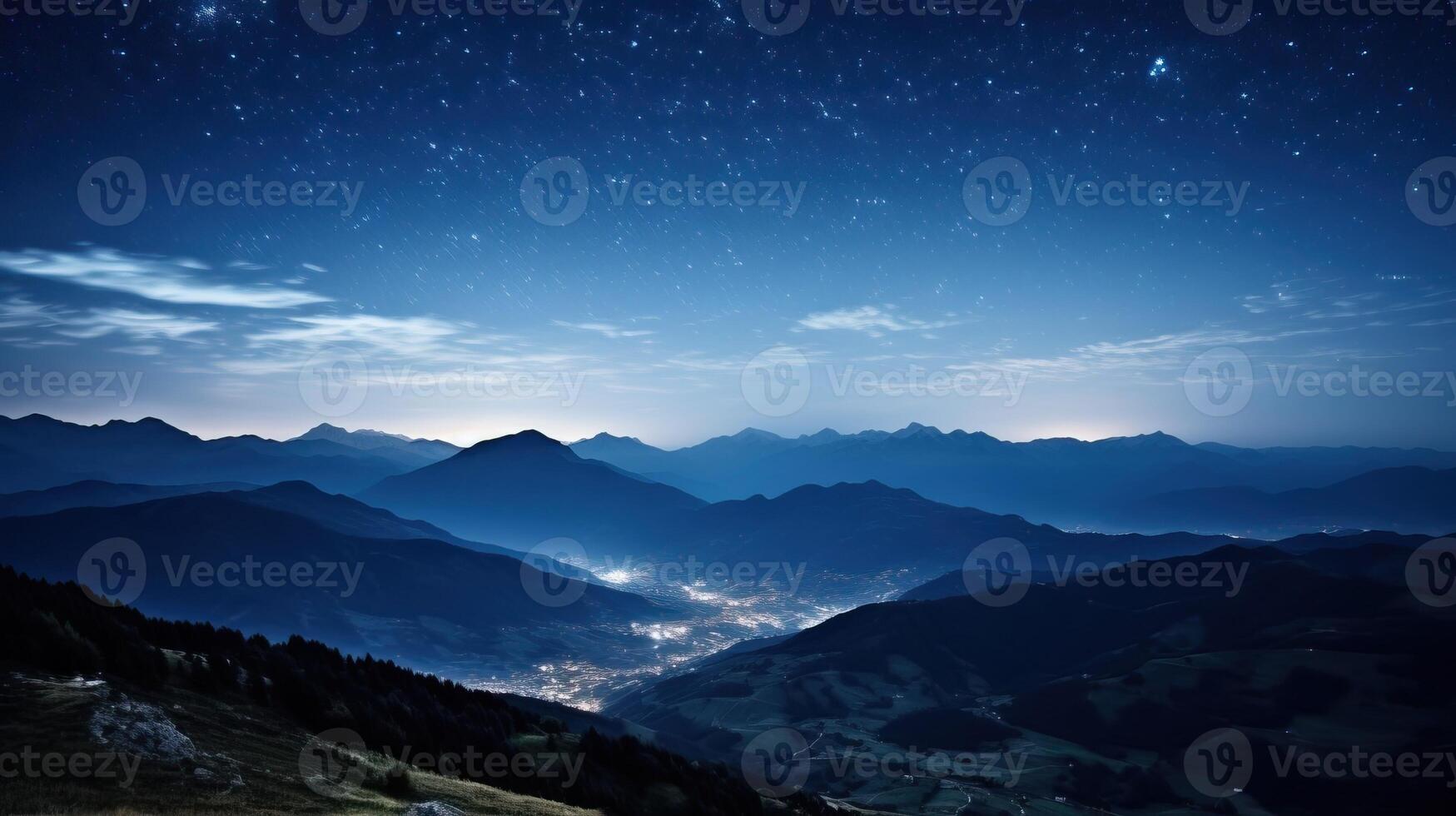 Mountains and a valley covered in fog under the breathtaking night sky full of stars. photo