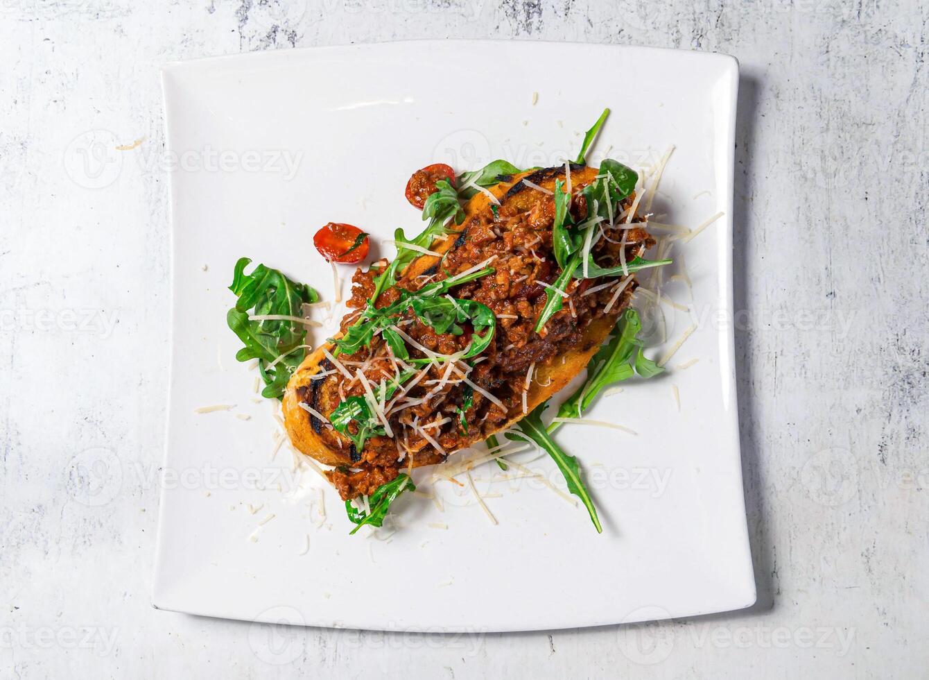 Savoury Mince on Toast served in plate isolated on background top view of italian food photo