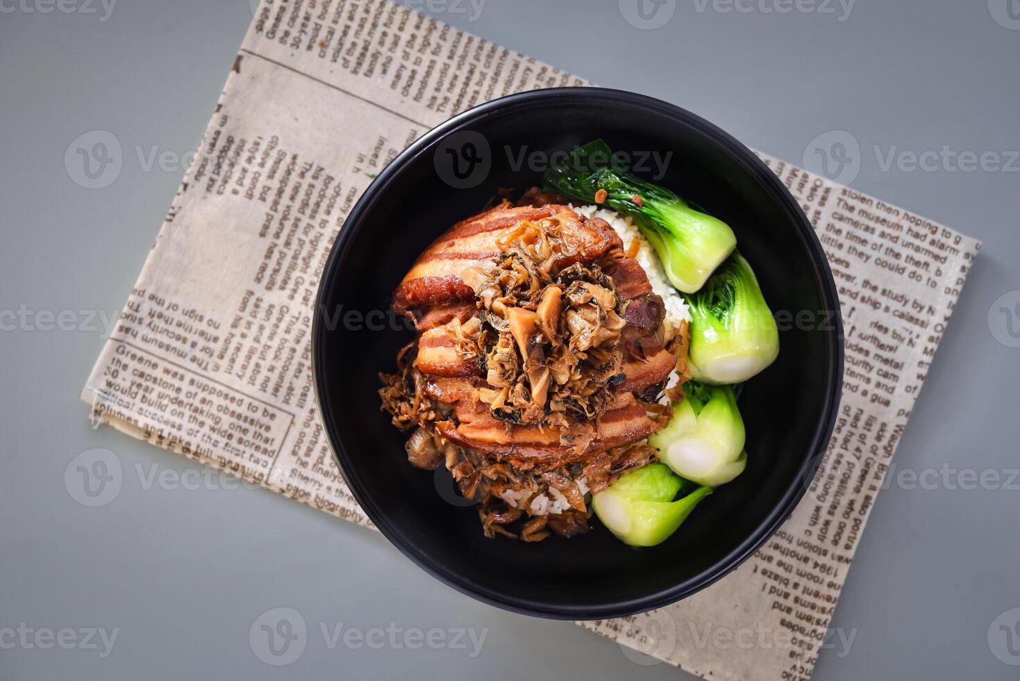 Pickled Pork Rice with Pickled Vegetables served in dish isolated on napkin top view of chinese food on grey background photo