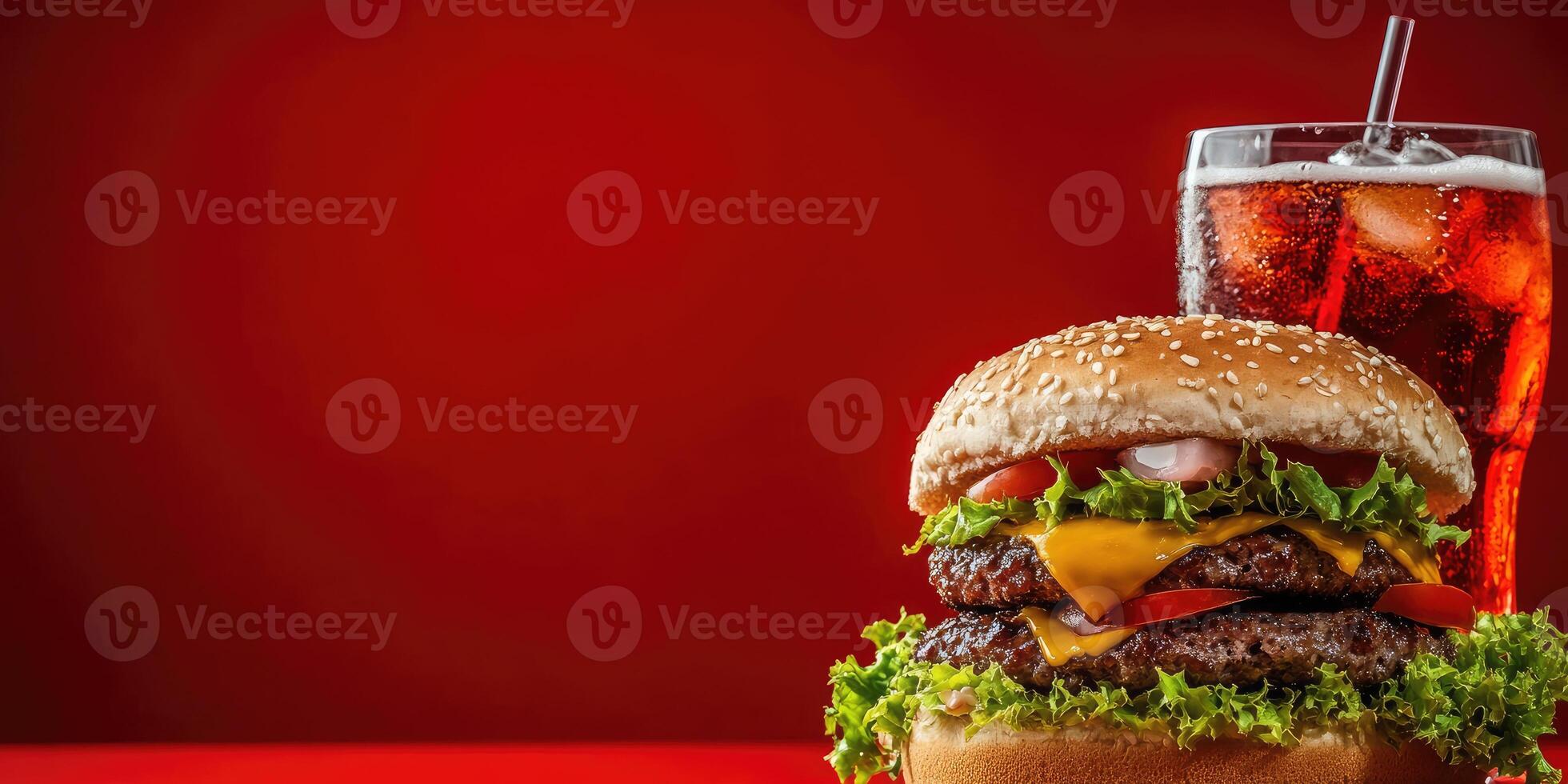 burger with glass cola on red background copy space photo