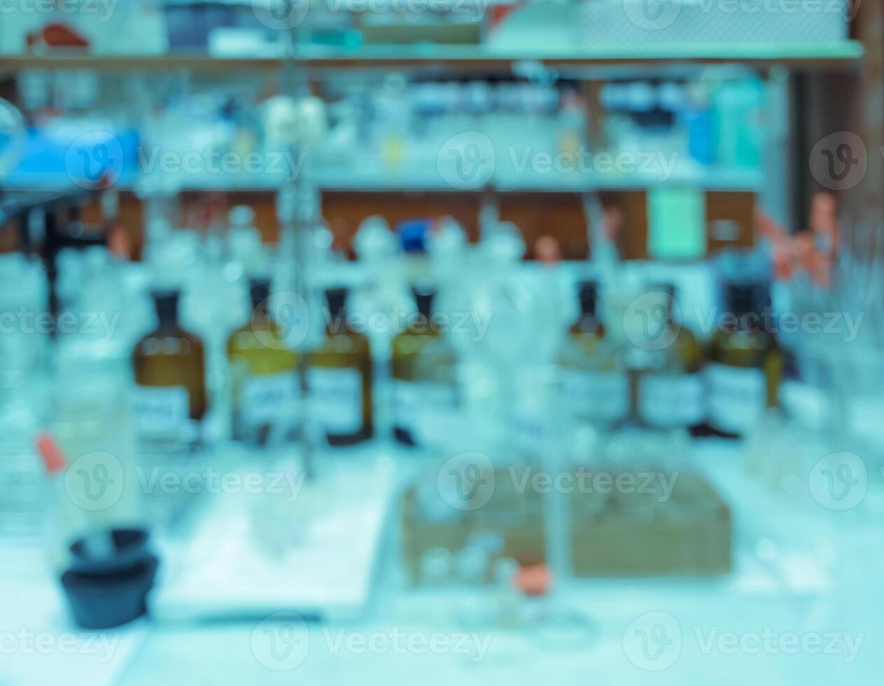 Blurred abstract background of workbench in chemistry laboratory photo