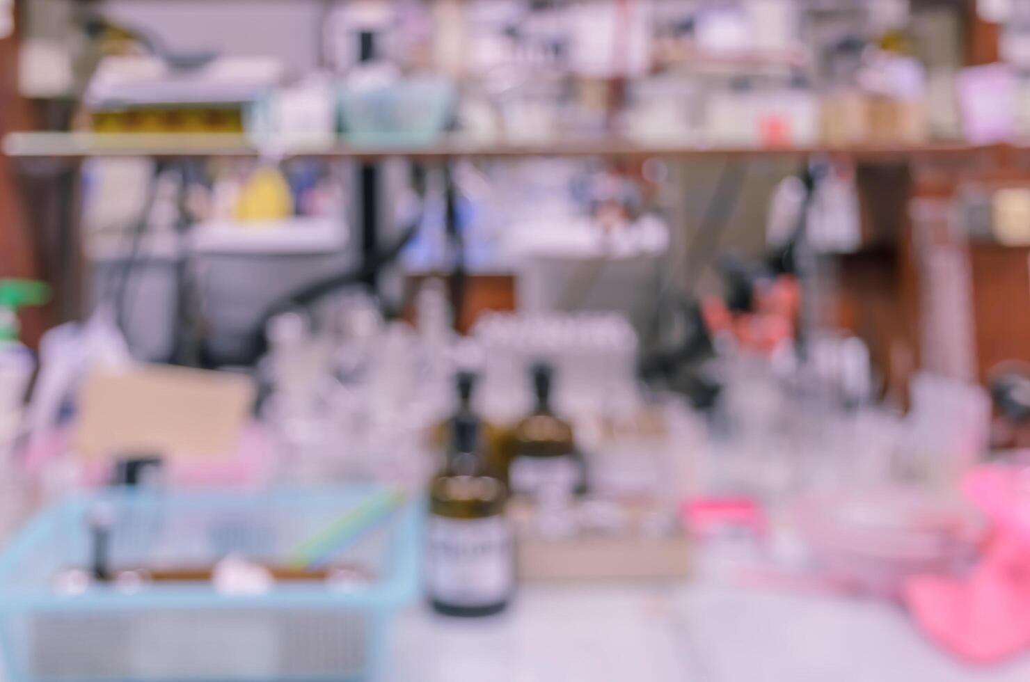 Blurred abstract background of workbench in chemistry laboratory photo