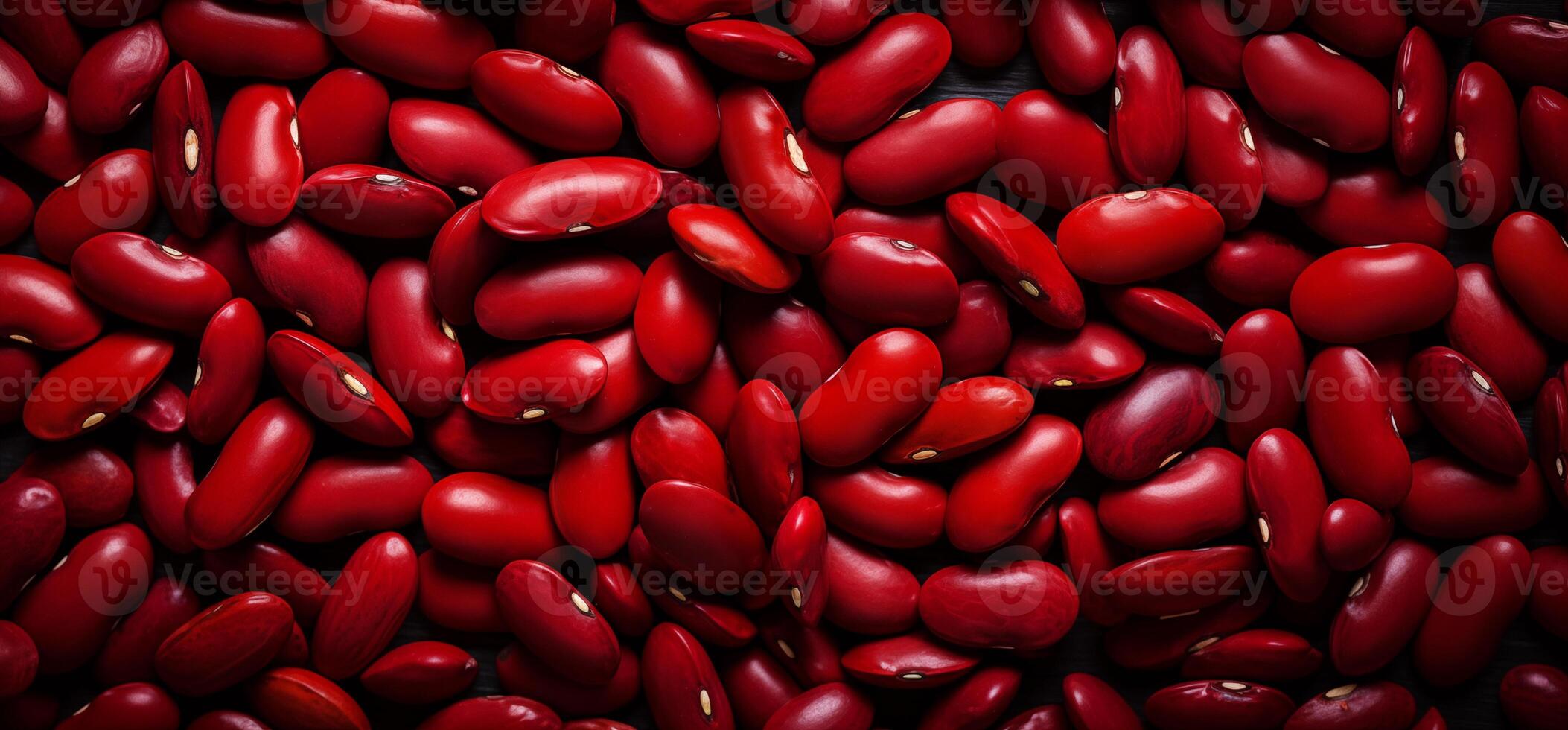 A pile of fresh red kidney beans form the background, shown from above photo