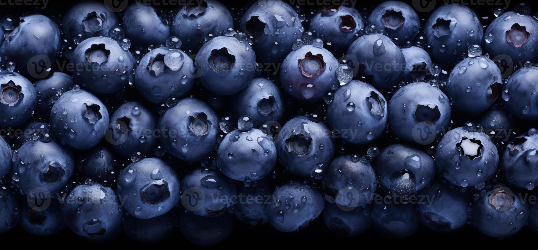 A pile of fresh Blueberry form the background, shown from above photo