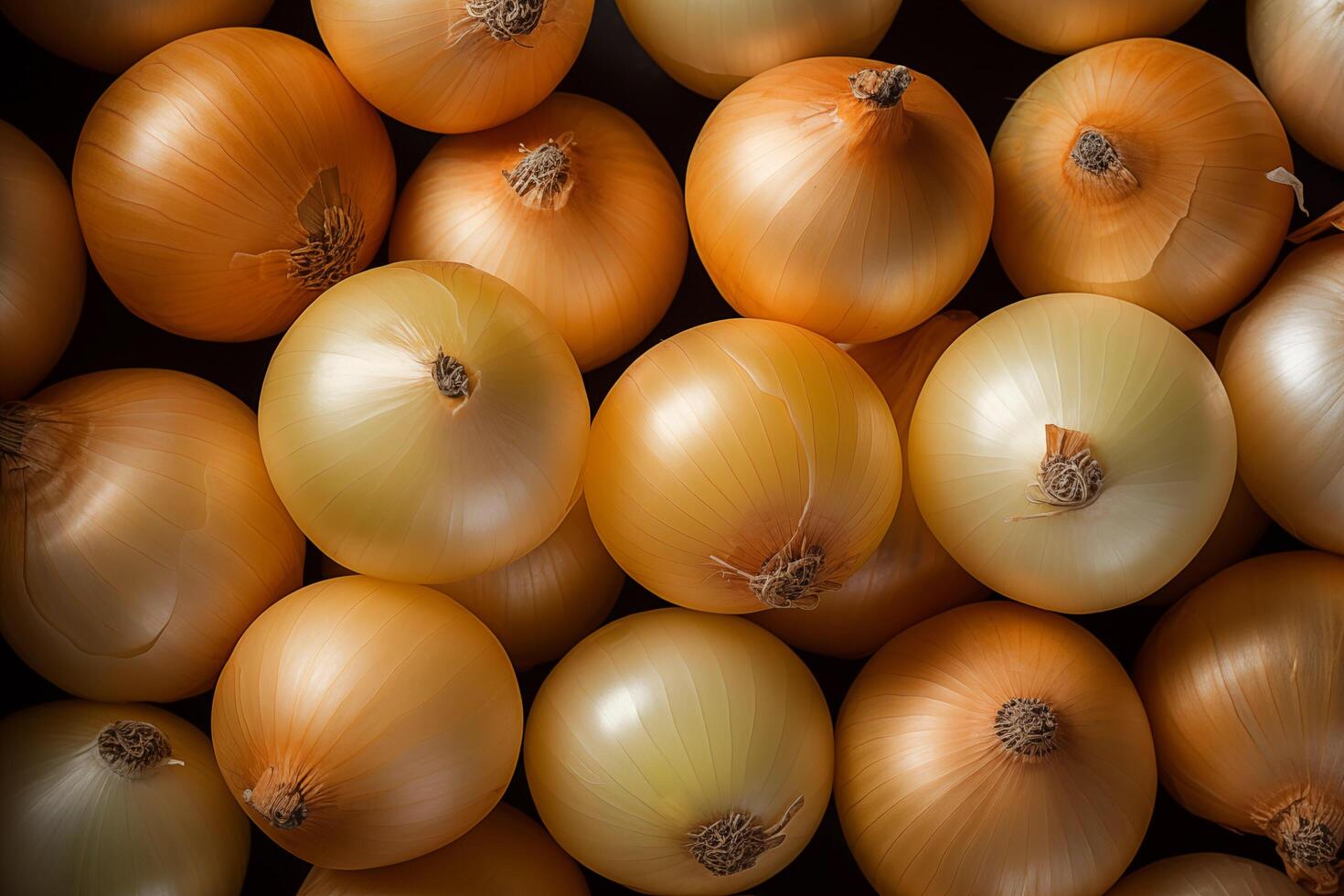 A pile of fresh onion form the background, shown from above photo