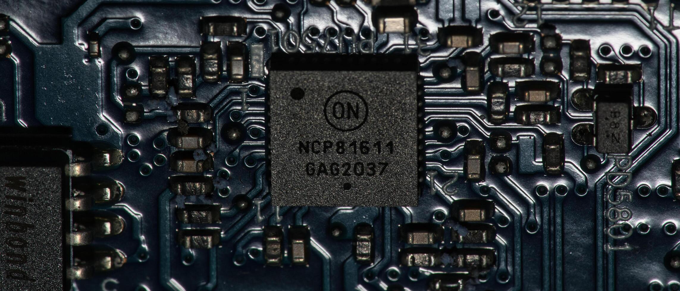 a close up of a circuit board with a chip photo