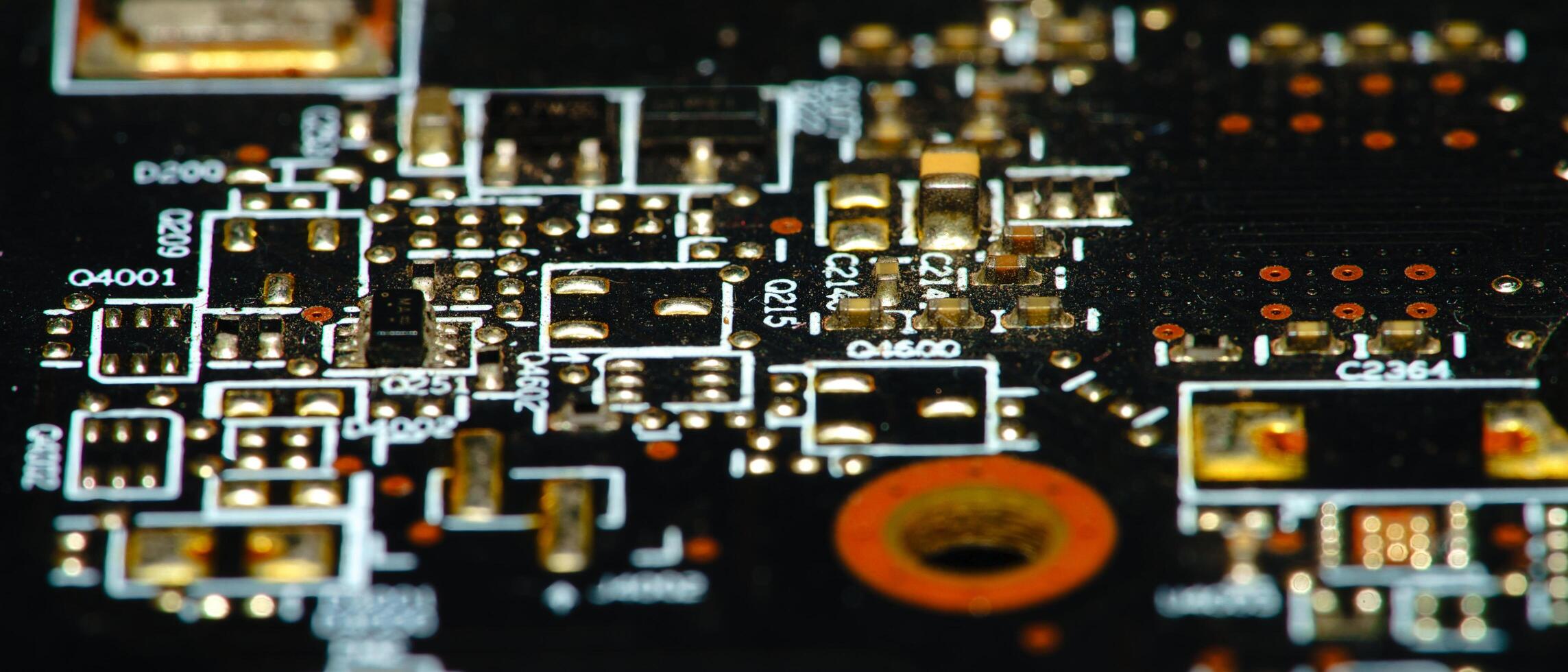 close up of a circuit board with many different components photo