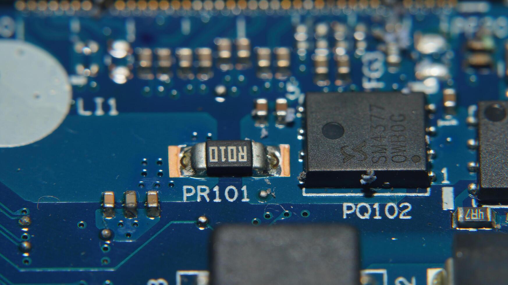 a close up of a circuit board with some electronic components photo