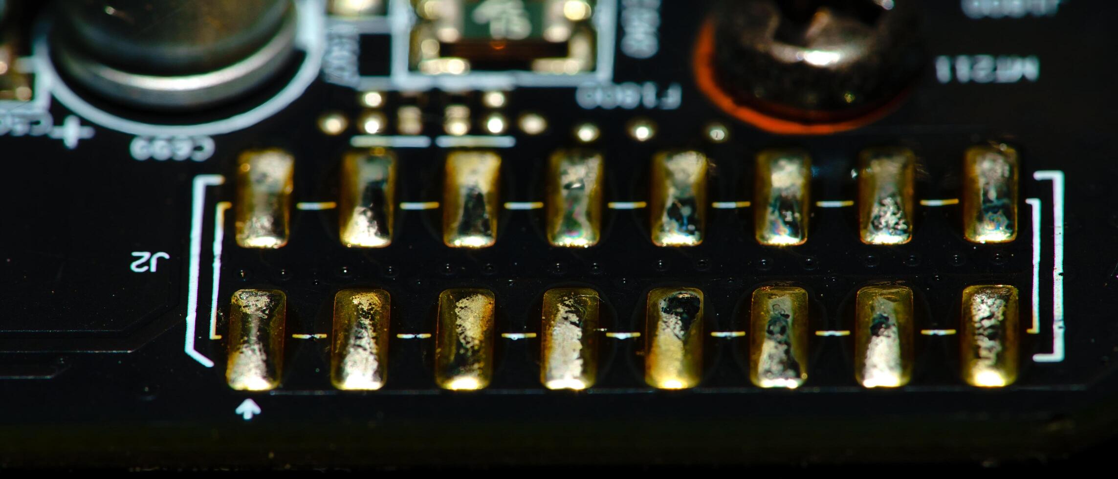 a close up of a circuit board with a bunch of different colored wires photo
