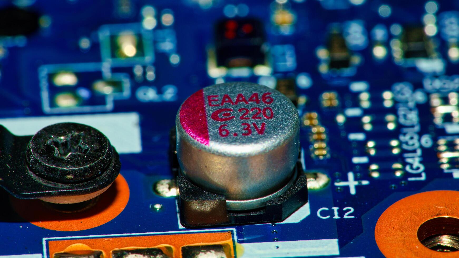 a close up of a circuit board with a small electronic device photo