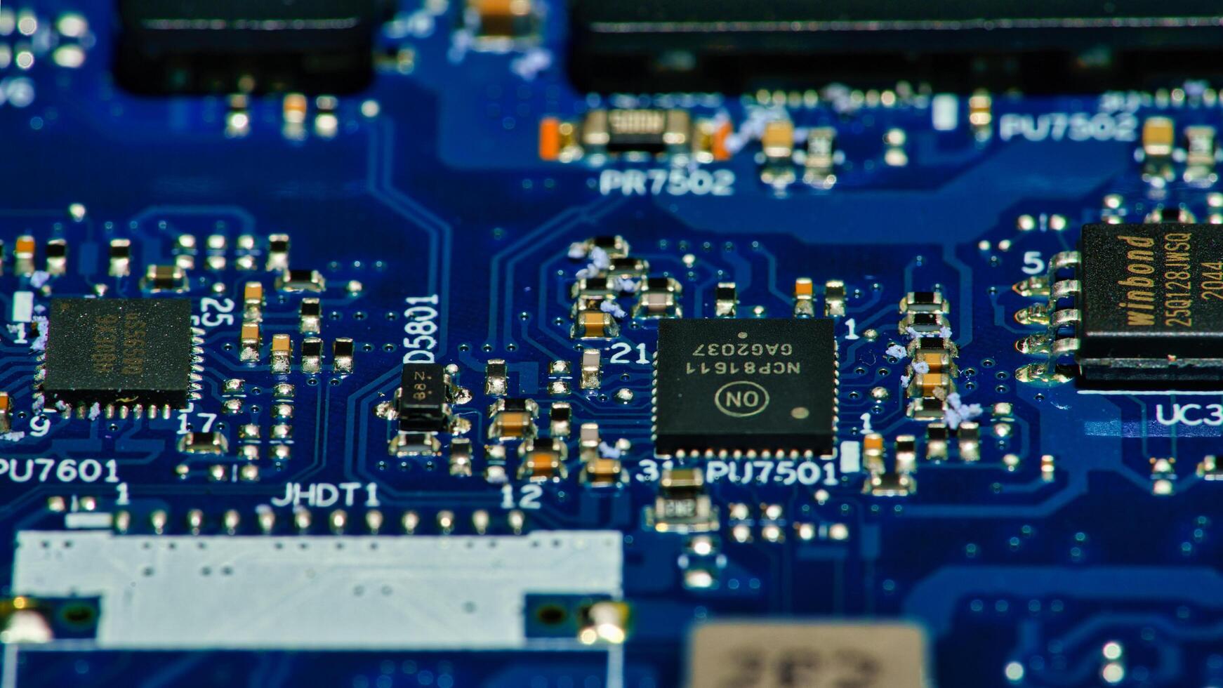 a close up of a computer motherboard with electronic components photo