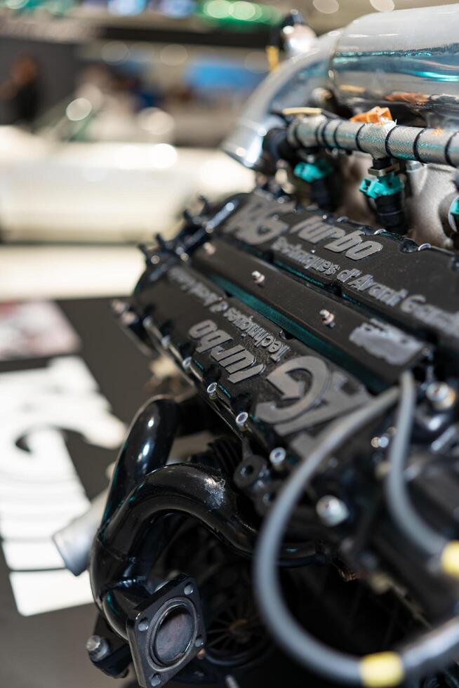Stuttgart, Germany, August 13, 2023. Car engine part. New engine new car. Clean car engine separately from the body. Close-up of a sports car engine. photo