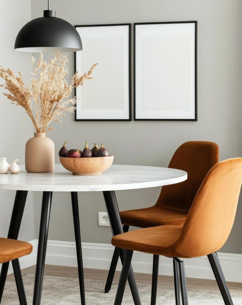 Modern dining area with circular table, stylish chairs, and abstract wall art photo