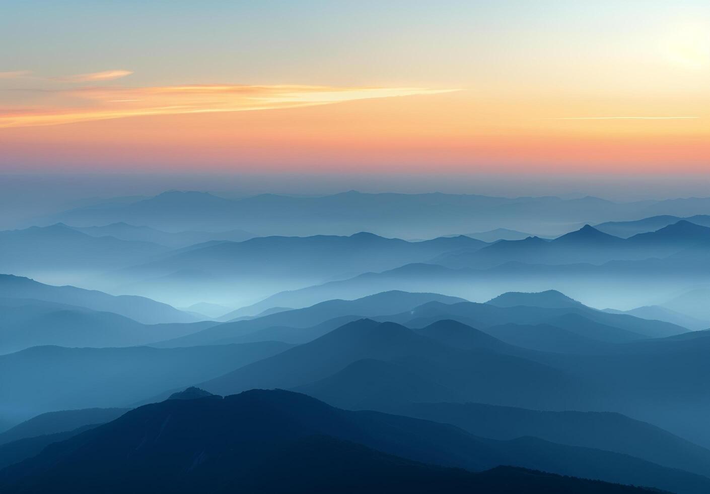 Serene Mountain Range at Dawn With Soft Mist and Gentle Hues photo