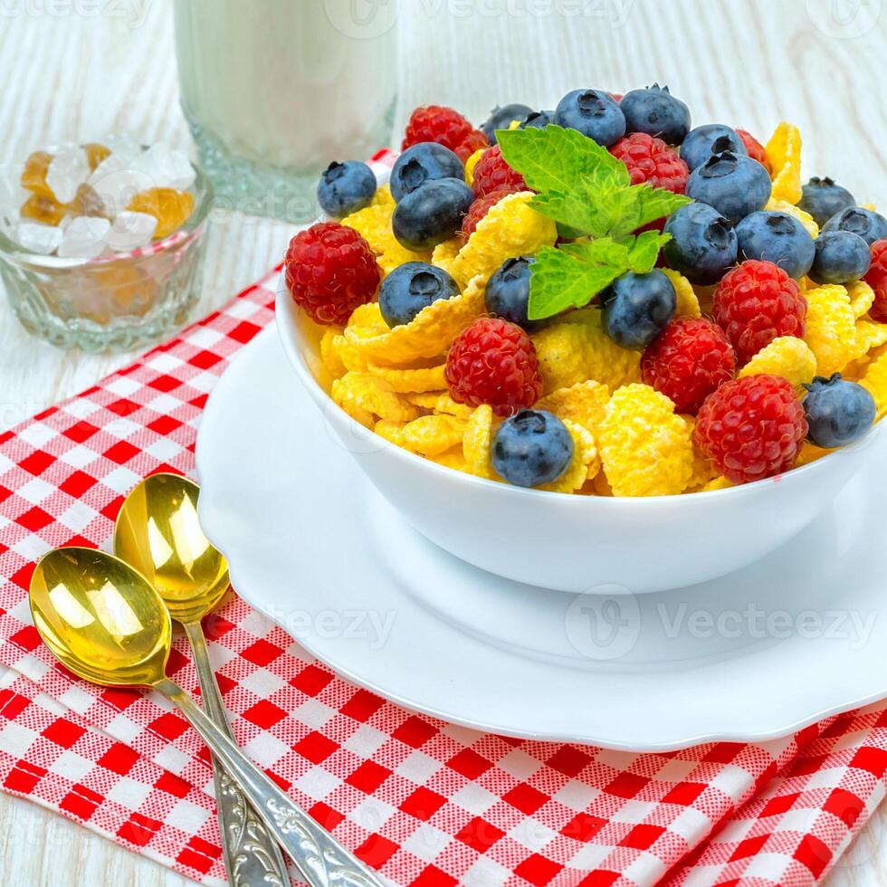 cornflakes, breakfast of cornflakes and berries photo