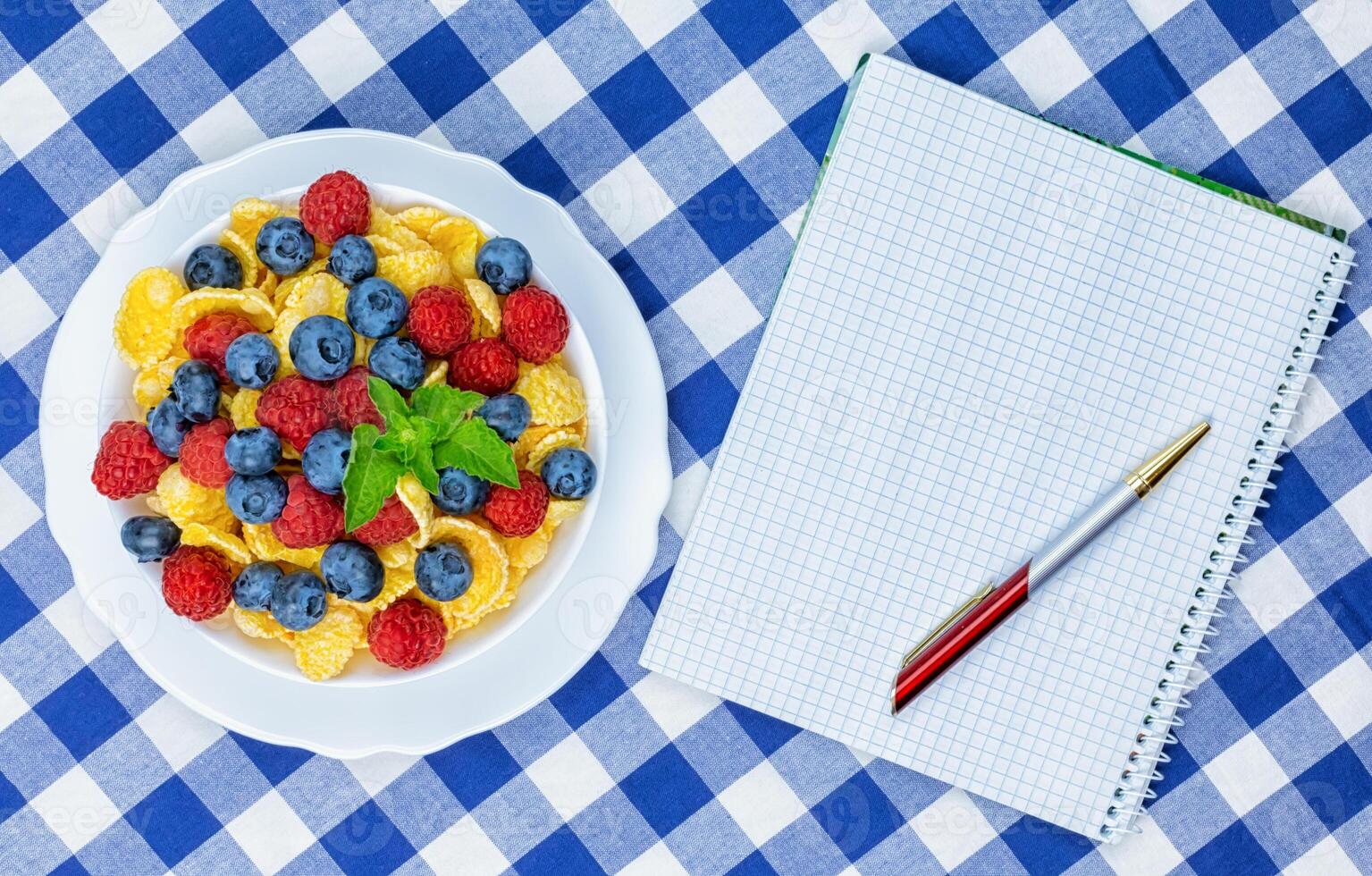 cornflakes, breakfast of cornflakes and berries photo