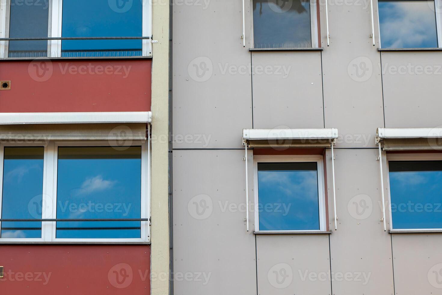 building with a red wall and white trim photo