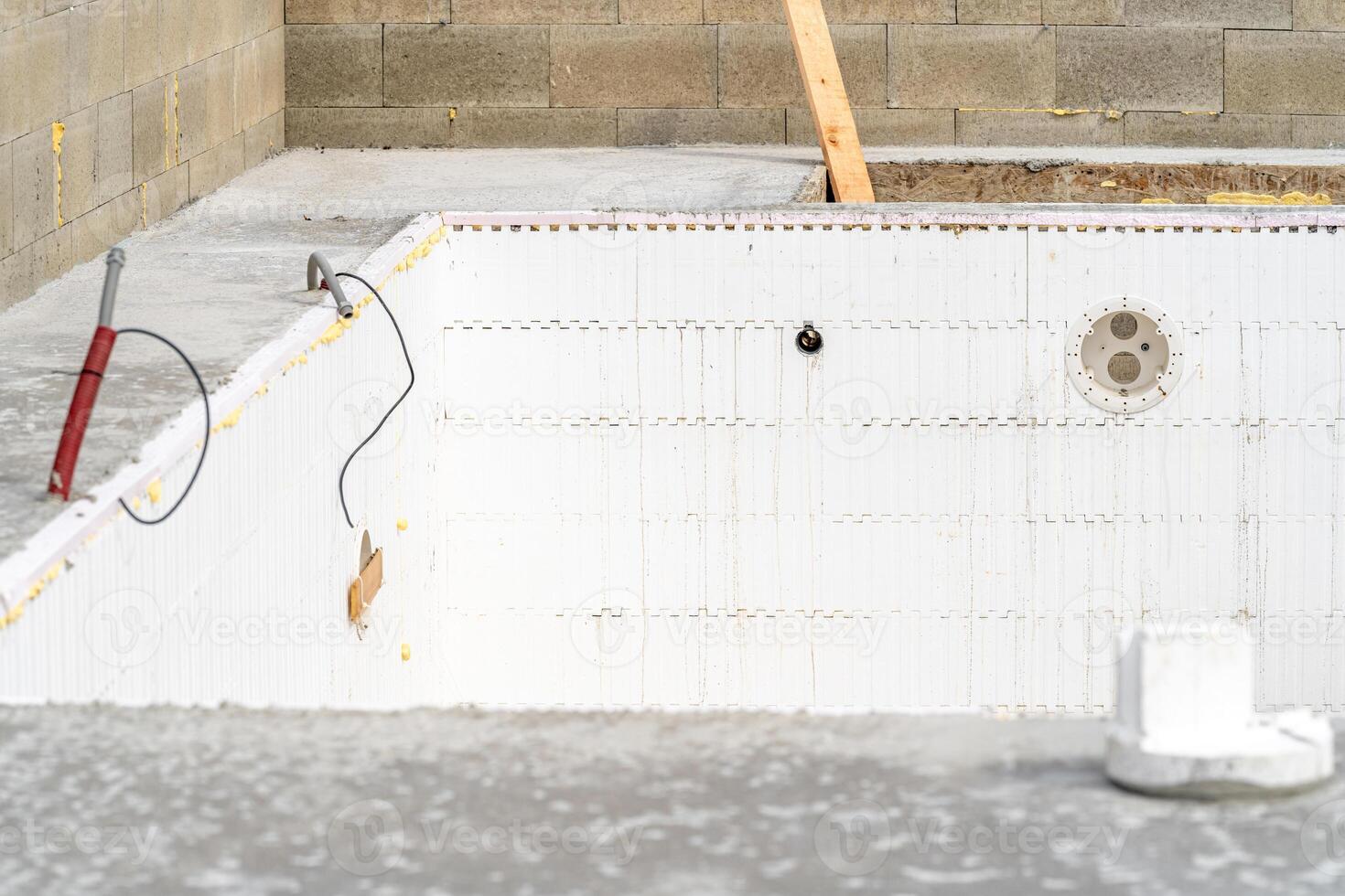 construction of a swimming pool at a family house photo