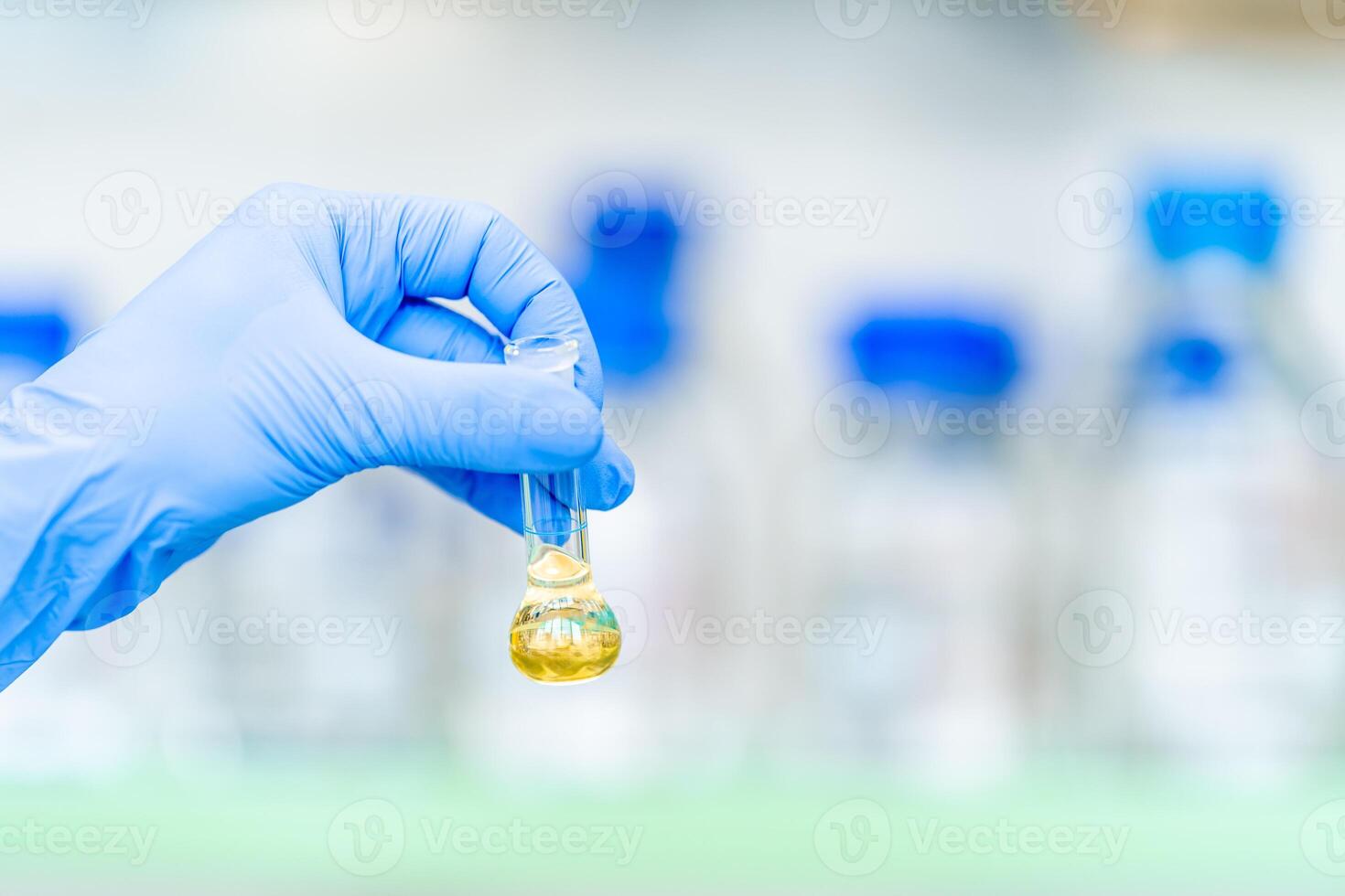 chemical substance in a glass test tube in a research laboratory. genetic test photo