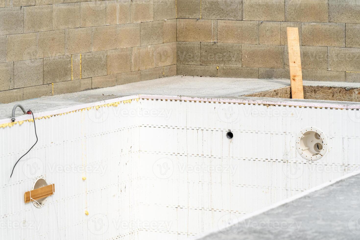 construction of a swimming pool at a family house photo