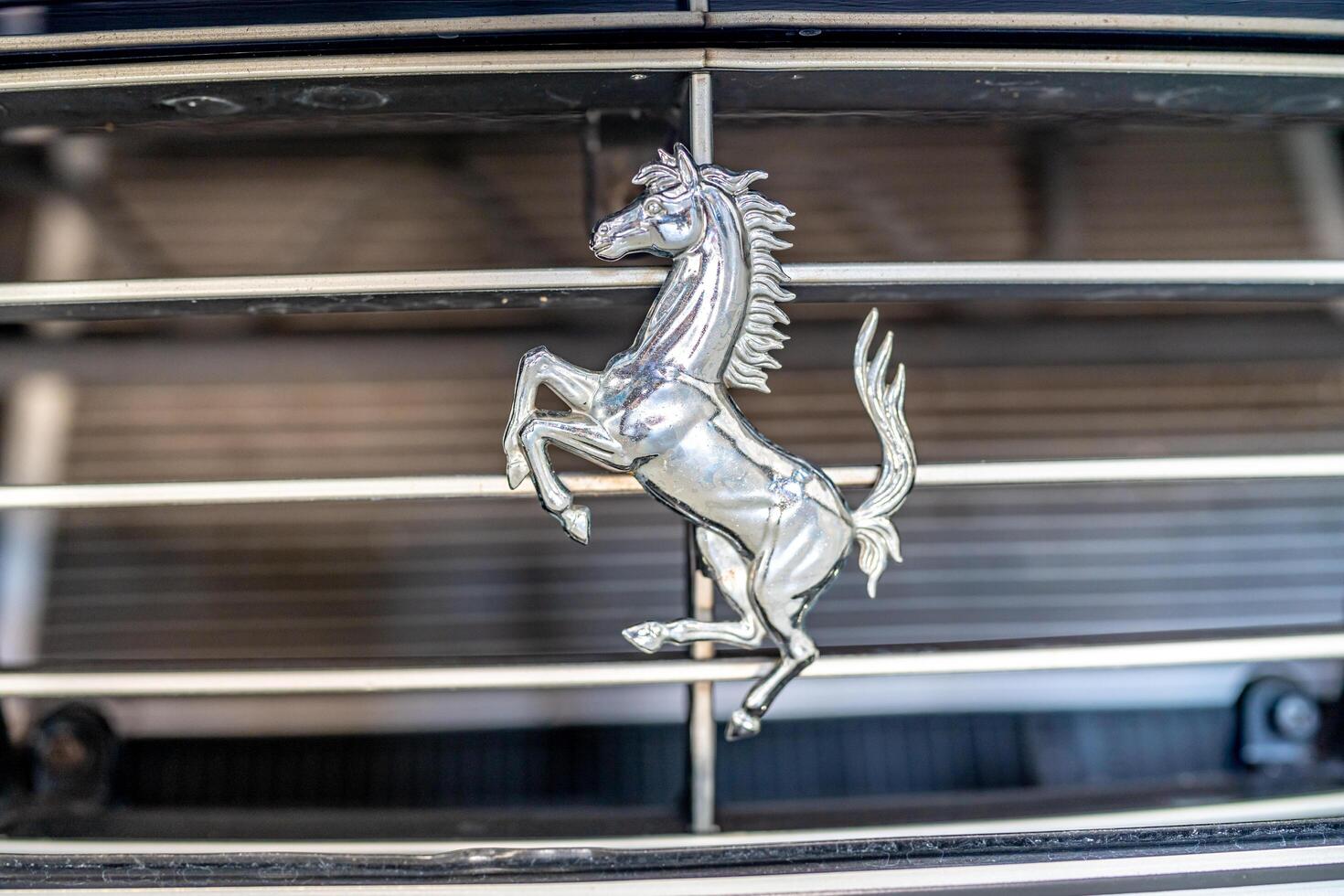 Olomouc, Czech - February 28,2023. ferrari symbol on the front fascia of the car photo