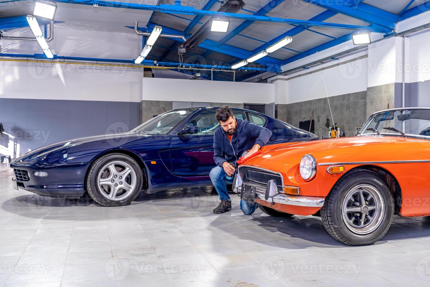 service and maintenance of luxury cars in the garage photo