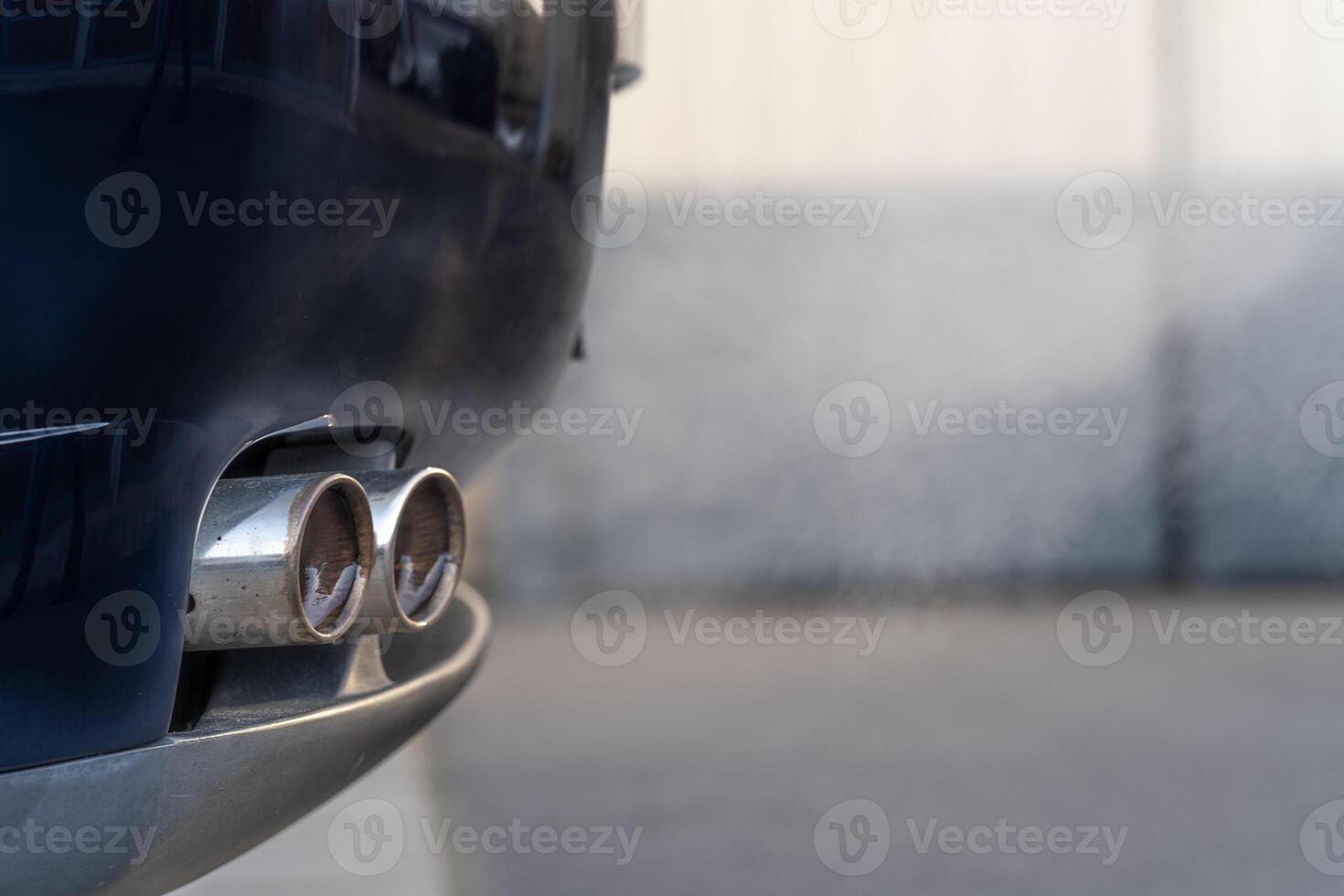 smoke from the exhaust of a car with a gasoline engine photo