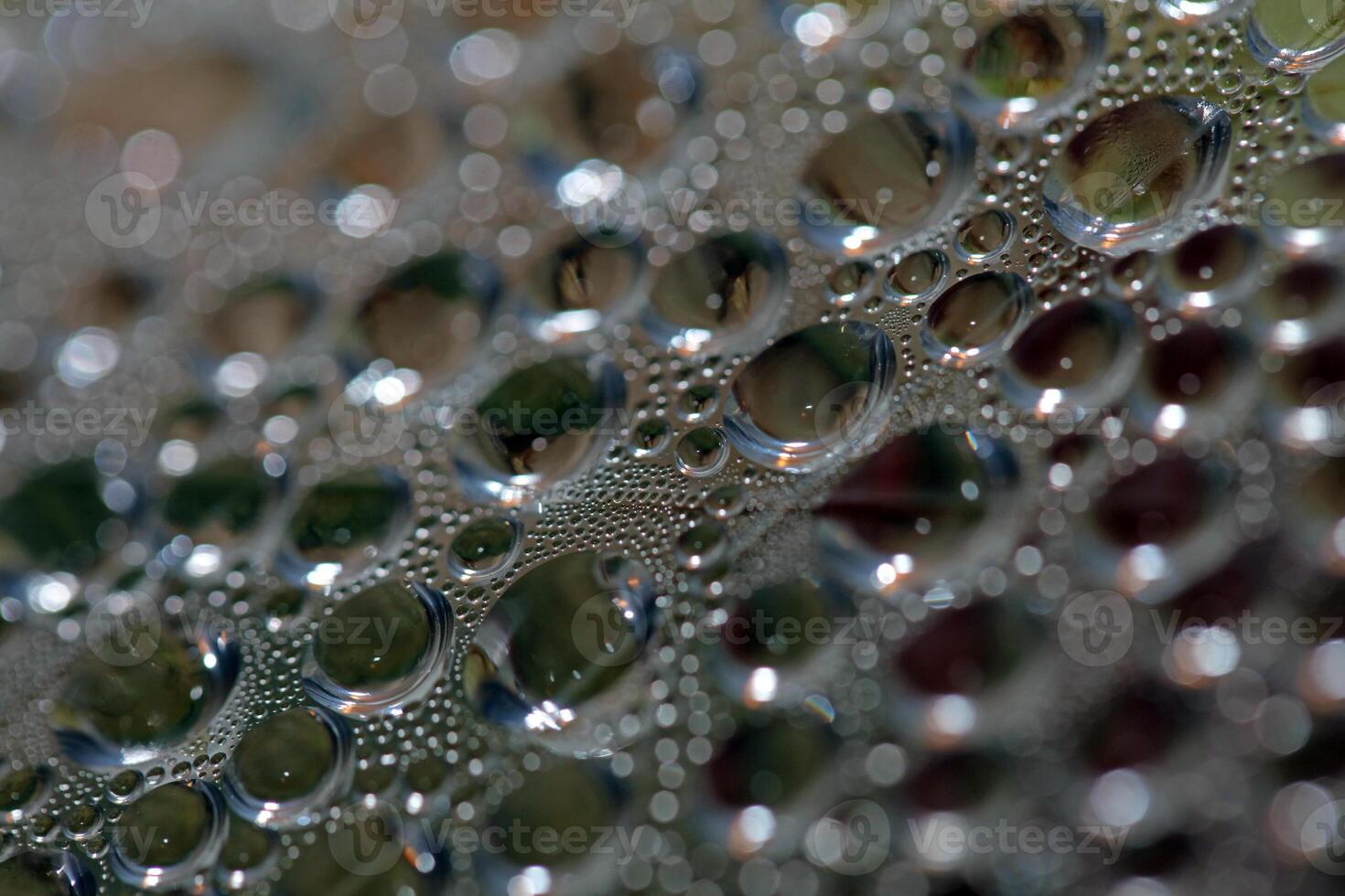Water humidity drops bubbles macro on water colorful background liquid moments fifty megapixels big size instant printings photo