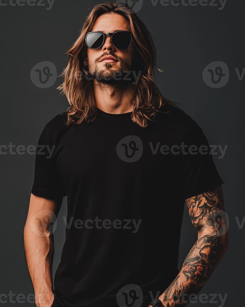 Model exudes confidence while showcasing a blank t-shirt in chic attire photo