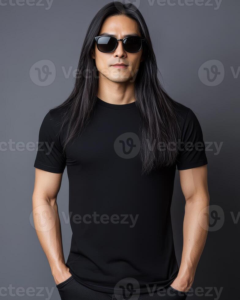 Model with long hair poses confidently, displaying a plain t-shirt effortlessly photo
