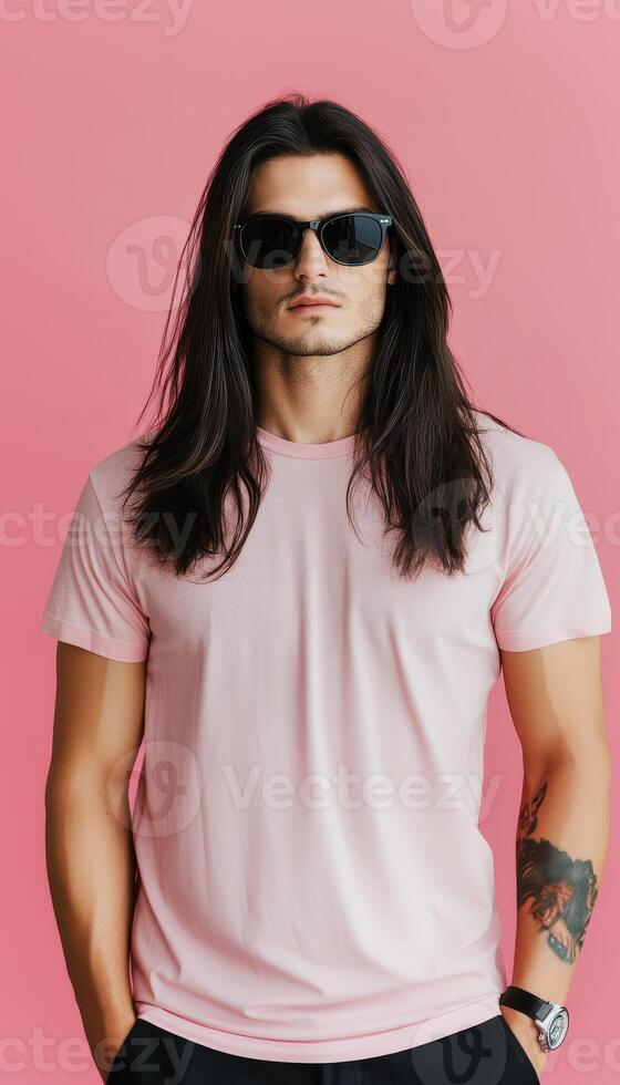 Handsome model poses confidently in a blank t-shirt and sunglasses photo