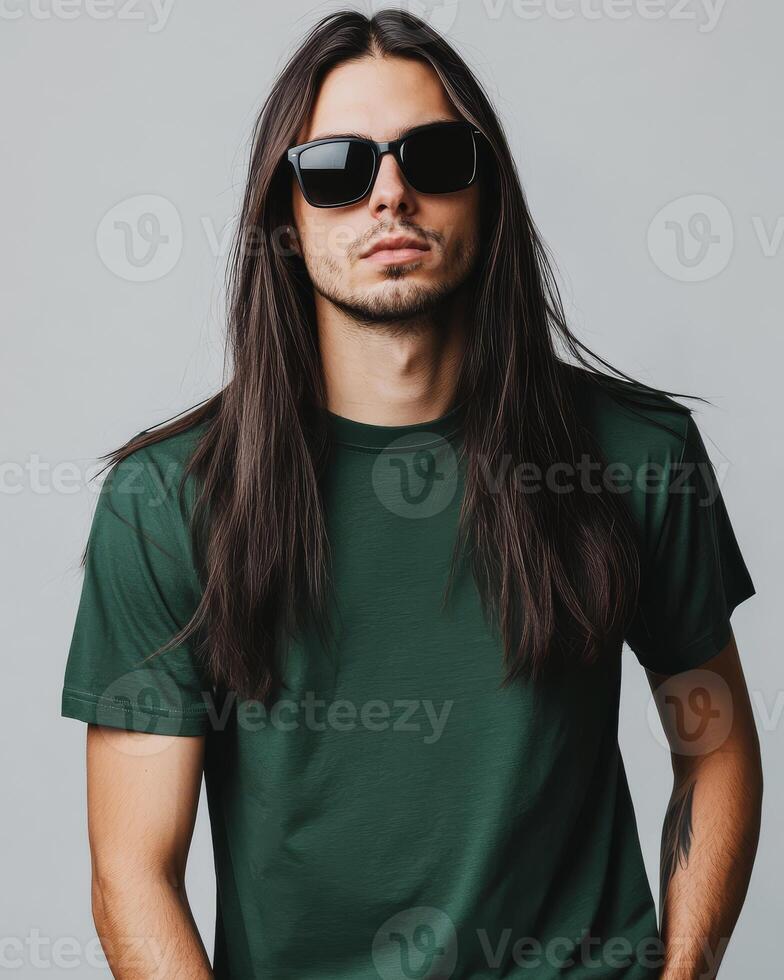 Model flaunts a blank t-shirt and sunglasses with a striking pose photo