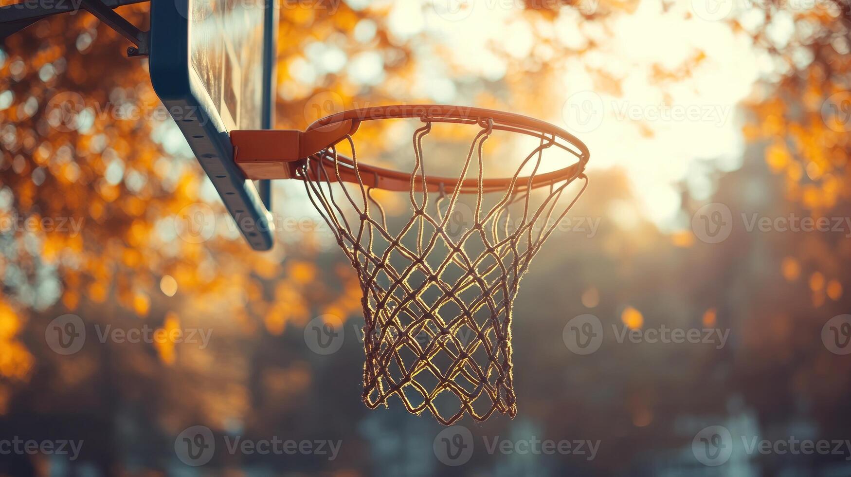 A basketball net is hanging from a hoop photo