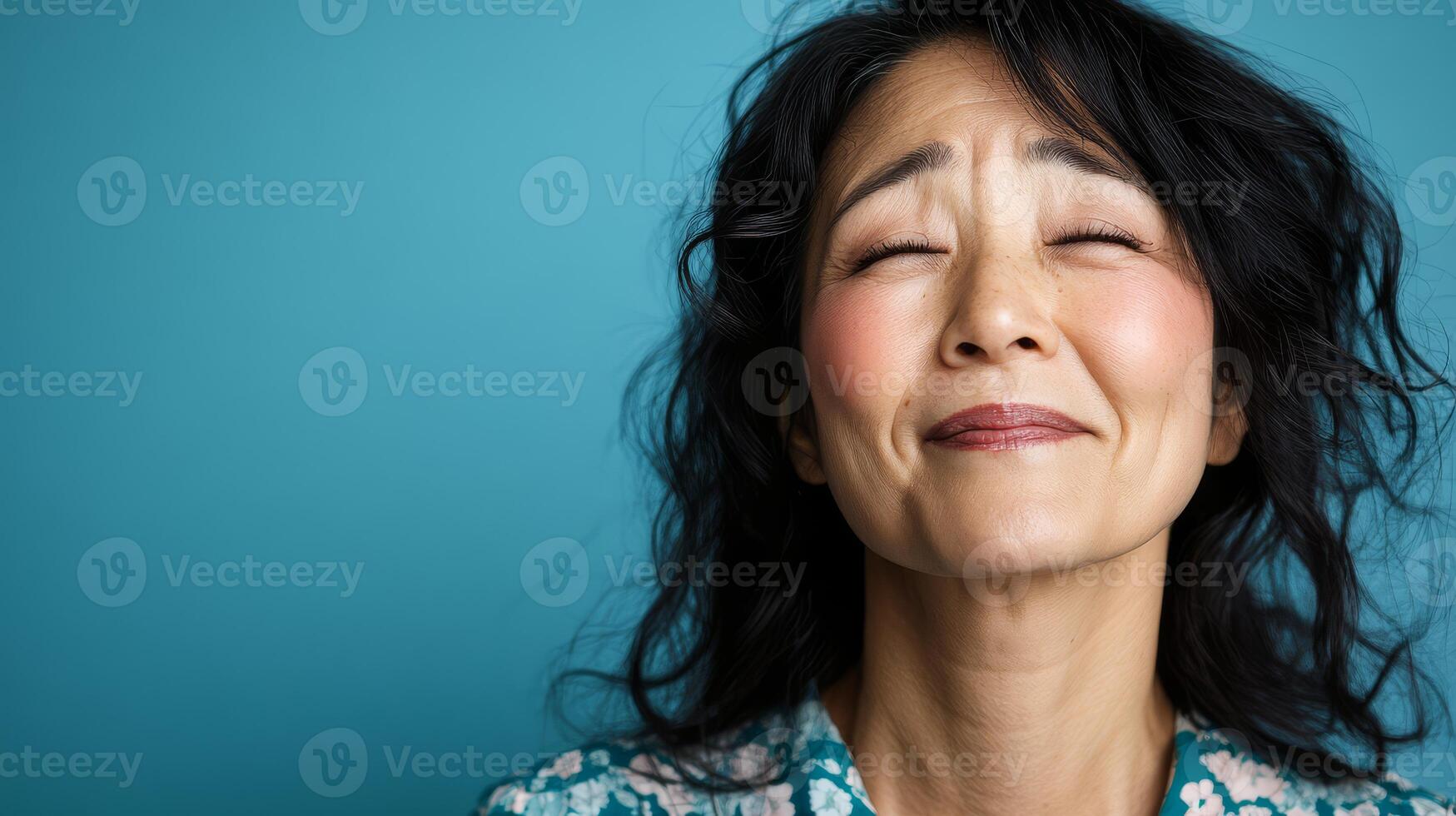 The model shares a joyful expression, radiating warmth and charm photo