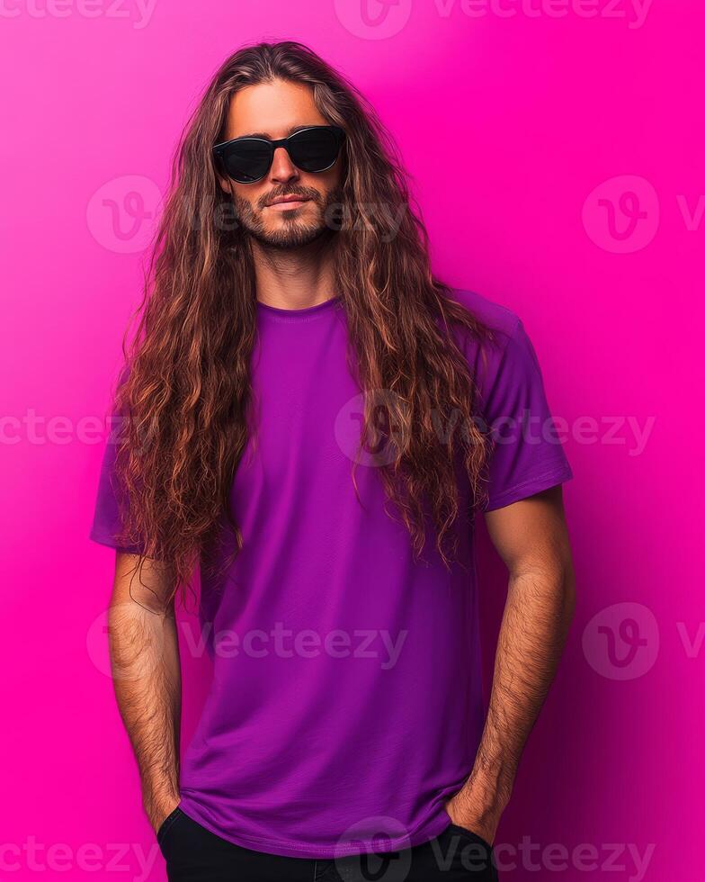 A confident model poses in a blank t-shirt with long hair and sunglasses photo