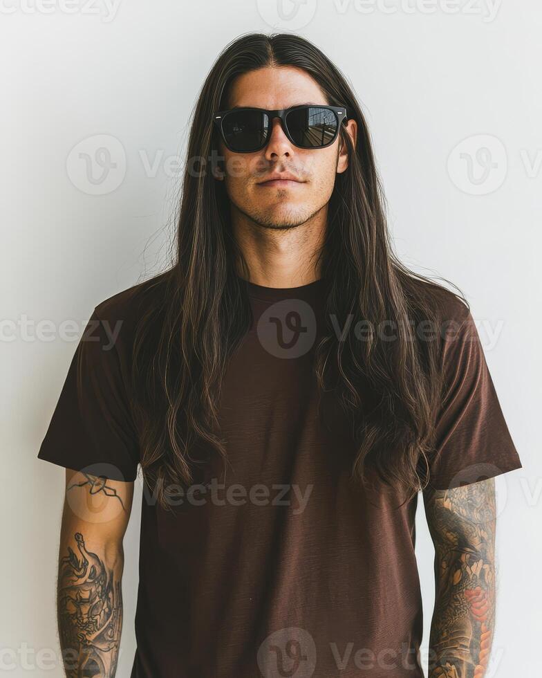 Handsome model displays a blank t-shirt while rocking cool sunglasses photo
