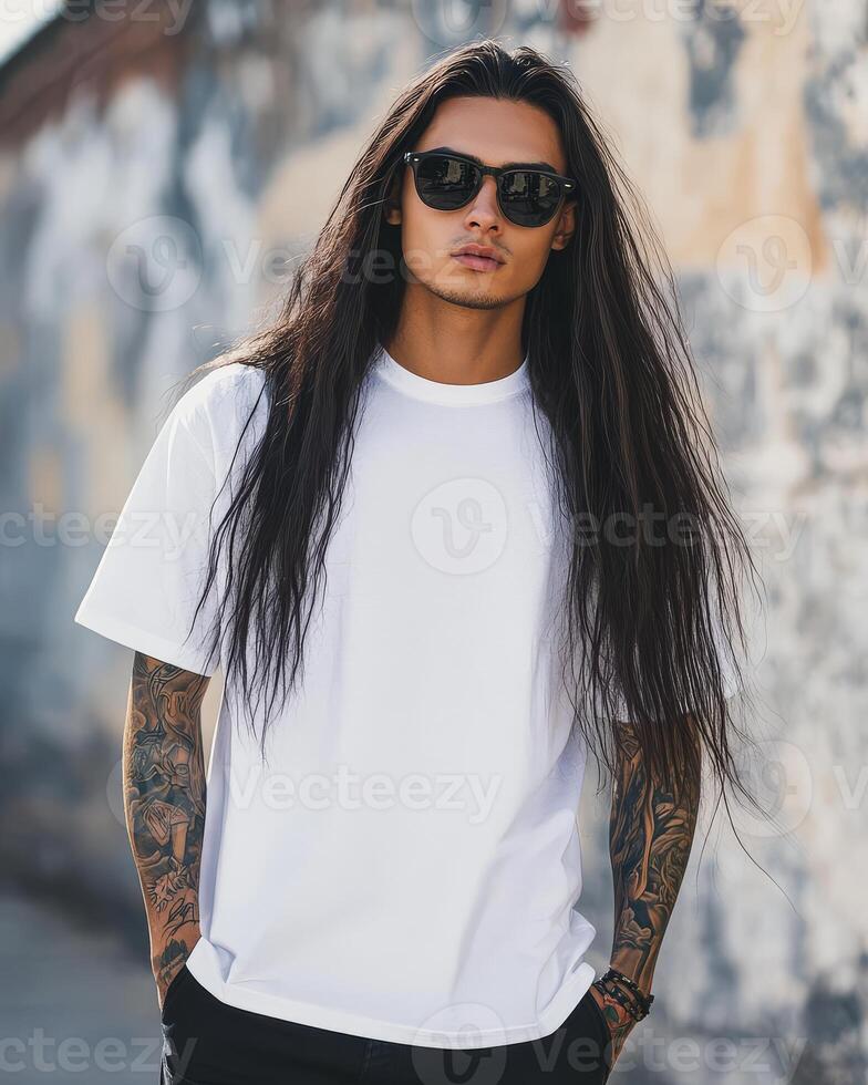 Model displays a blank t-shirt with confidence and a cool demeanor photo