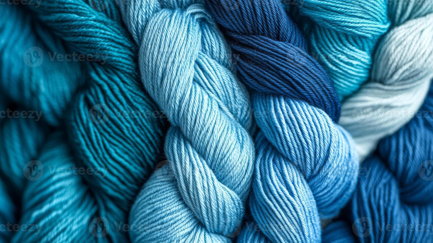 Beautiful strands of blue yarn create a stunning visual display of texture photo